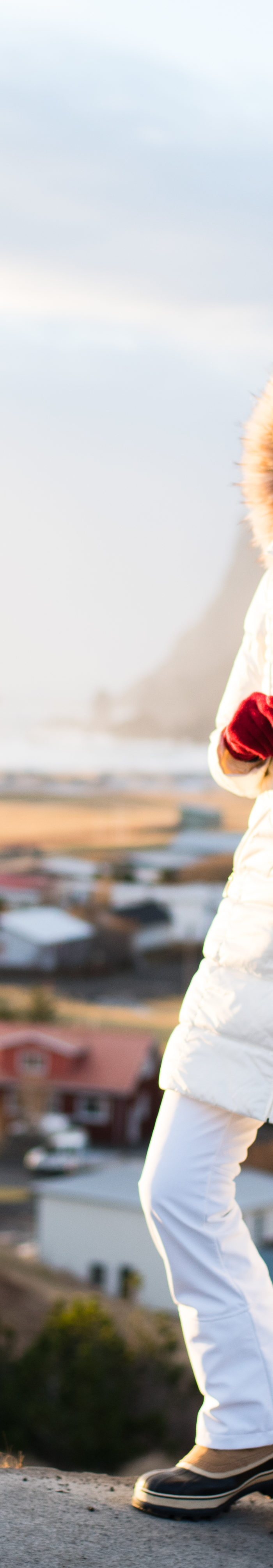 Miss USA 2011 Alyssa Campanella of The A List blog wearing Ellen Tracy faux fur coat and Sorel Caribou boots in Iceland