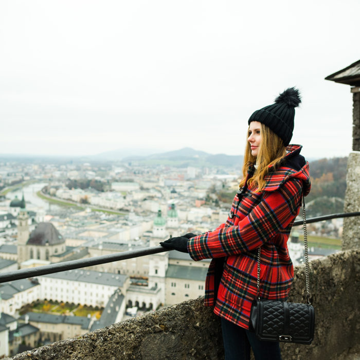 Alyssa Campanella of The A List blog sharing her favorite coats for fall and winter wearing Gloverall in Austria