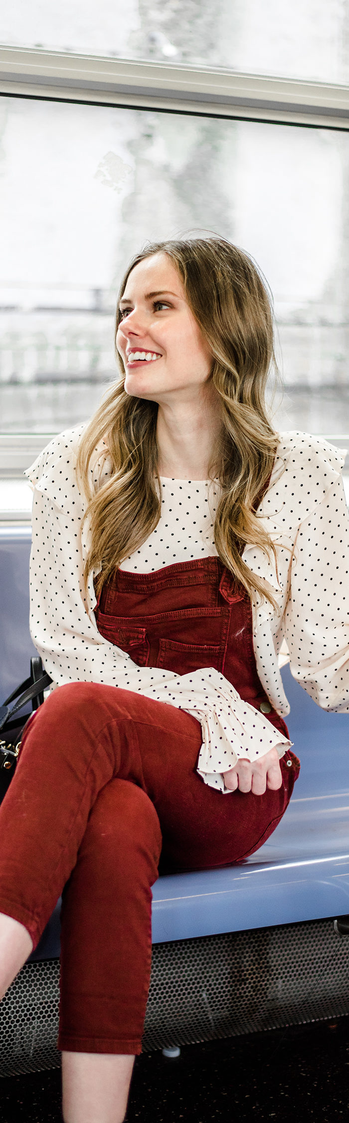 Alyssa Campanella of The A List blog enjoys autumn in New York wearing Free People washed denim overalls and Clare V Alistair bag