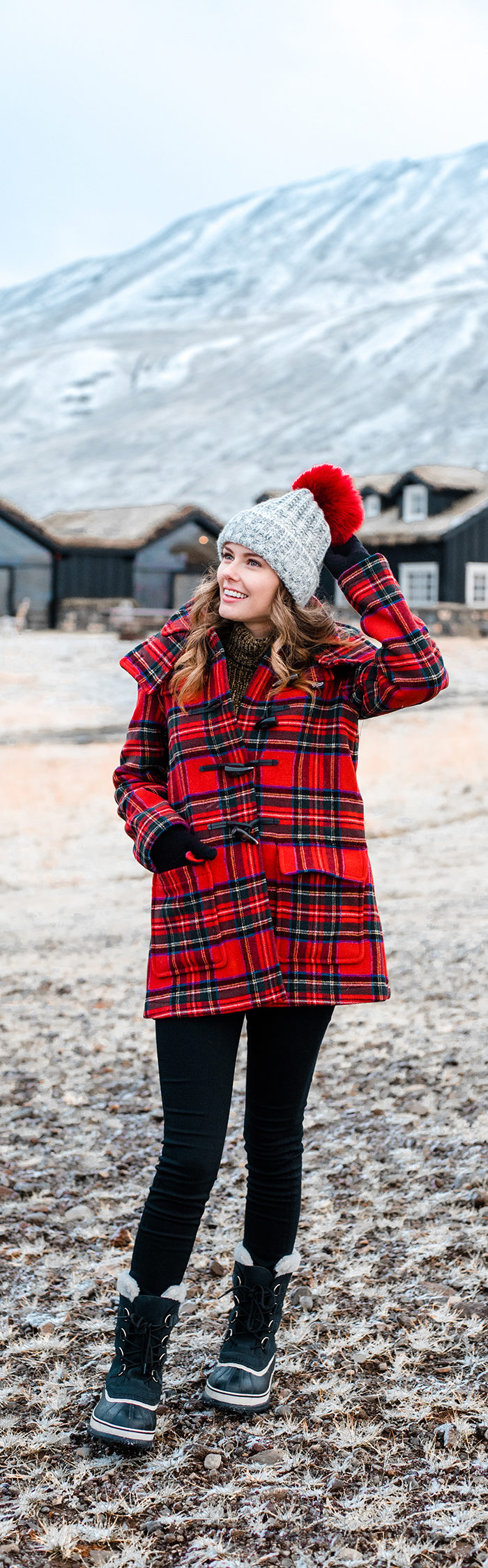 Alyssa Campanella of The A List blog visits Deplar Farm in northern Iceland wearing Gloverall plaid coat and Sorel Caribou boots