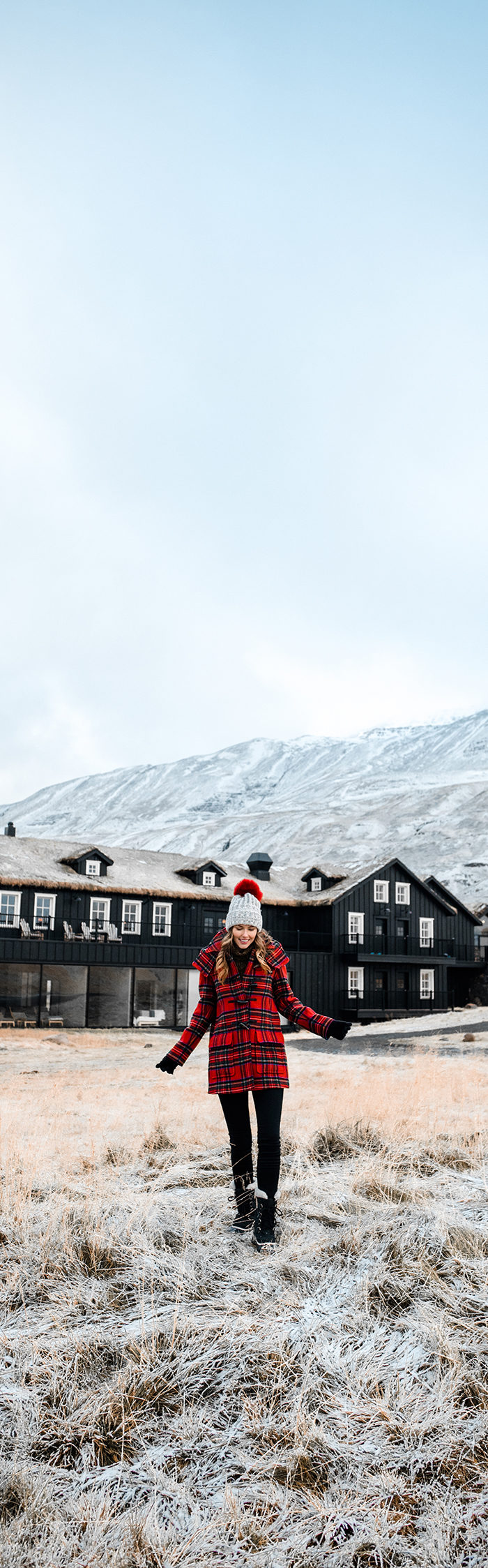 Alyssa Campanella of The A List blog visits Deplar Farm in northern Iceland wearing Gloverall plaid coat and Sorel Caribou boots