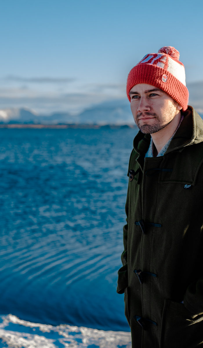 Torrance Coombs and wife Alyssa Campanella of The A List blog visit Lake Myvatn on their road trip from Akureyri to Vik, Iceland wearing Gloverall monty coat