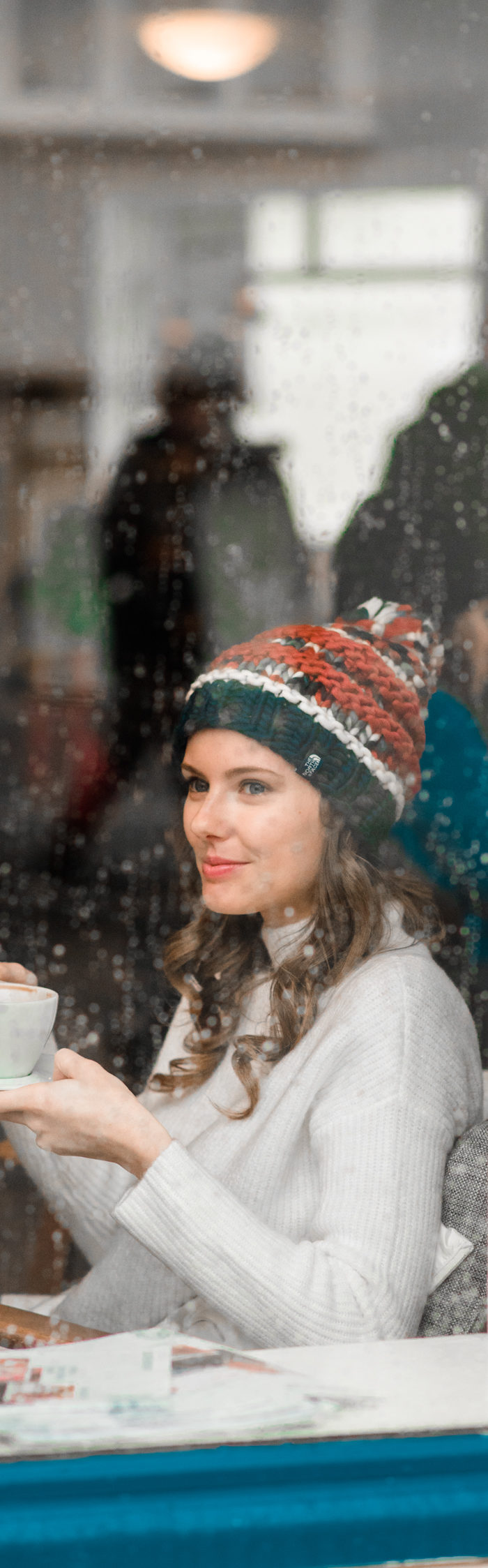 Alyssa Campanella of The A List blog visits Reykjavik, Iceland wearing Ellen Tracy faux fur coat, The North Face Nanny Knit Beanie, and Hunter Tour rainboots in Navy