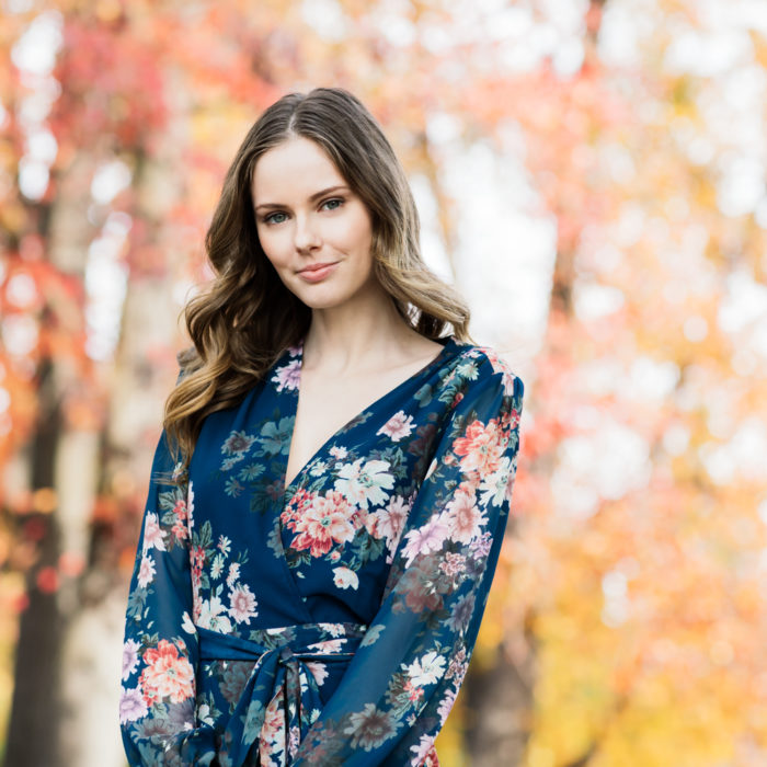 Alyssa Campanella of The A List blog sharing her favorite winter floral dress wearing Yumi Kim Dance With Me Dress, Cuyana top handle bag, and Sezane Emilie boots.