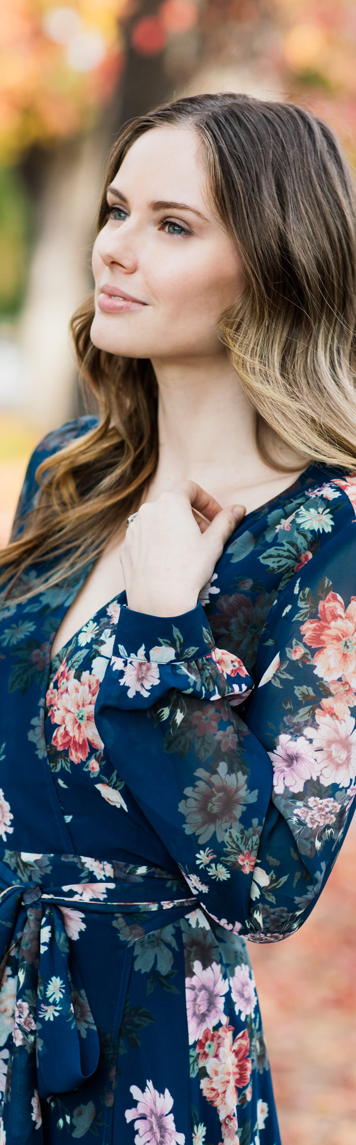 Alyssa Campanella of The A List blog sharing her favorite winter floral dress wearing Yumi Kim Dance With Me Dress, Cuyana top handle bag, and Sezane Emilie boots.