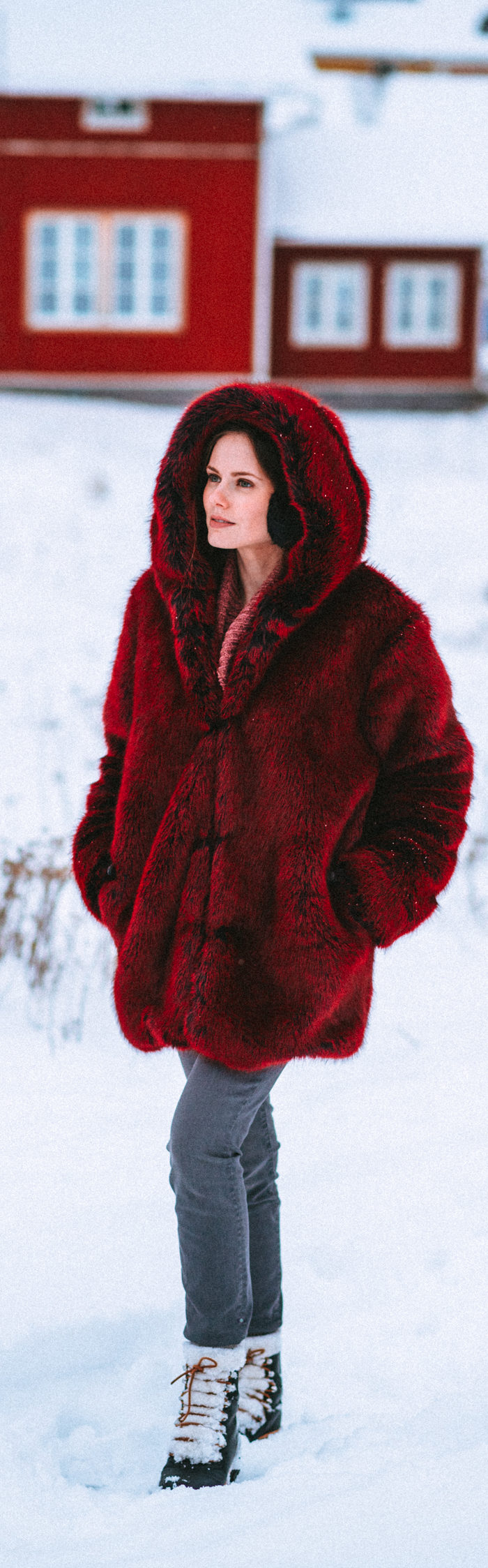 Alyssa Campanella of The A List blog wears the faux fur LPA Coat 84 and Marc Fisher Izzie boots while enjoying a day trip to Porvoo, Finland