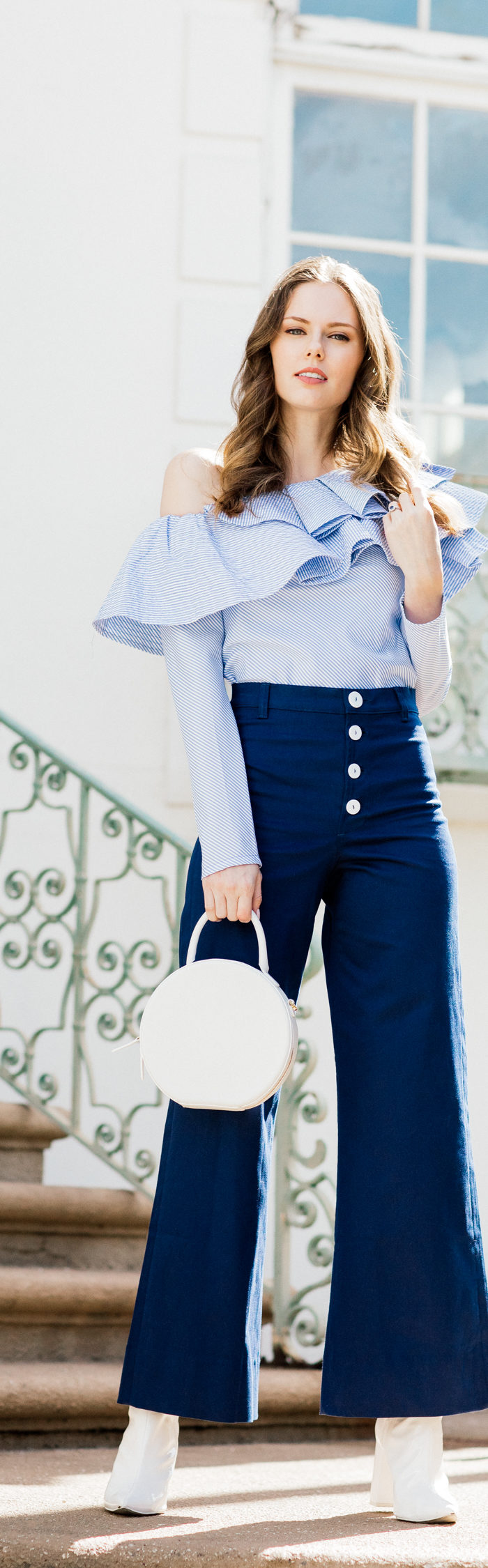 Alyssa Campanella of The A List blog shares white accessories for spring in Staud Novak pants and Mansur Gavriel white circle bag