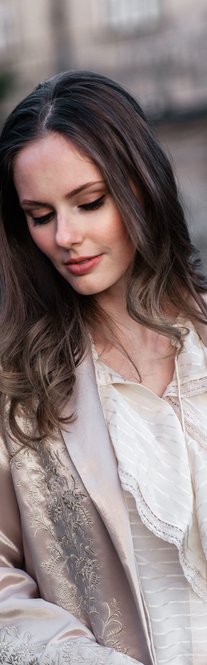 Alyssa Campanella of The A List blog wears the Maryella coat from Paige denim at the romantic Irish castle Cabra Castle in Ireland