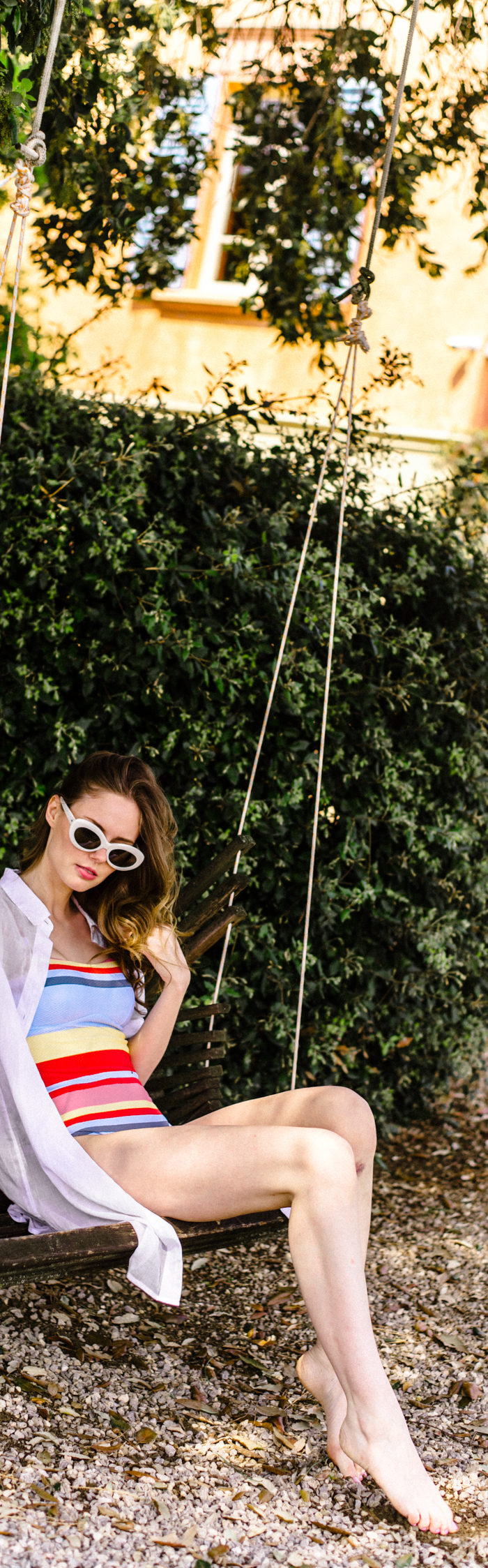 Alyssa Campanella of The A List visits Fontelunga villa in Tuscany, Italy wearing Asceno striped swimsuit