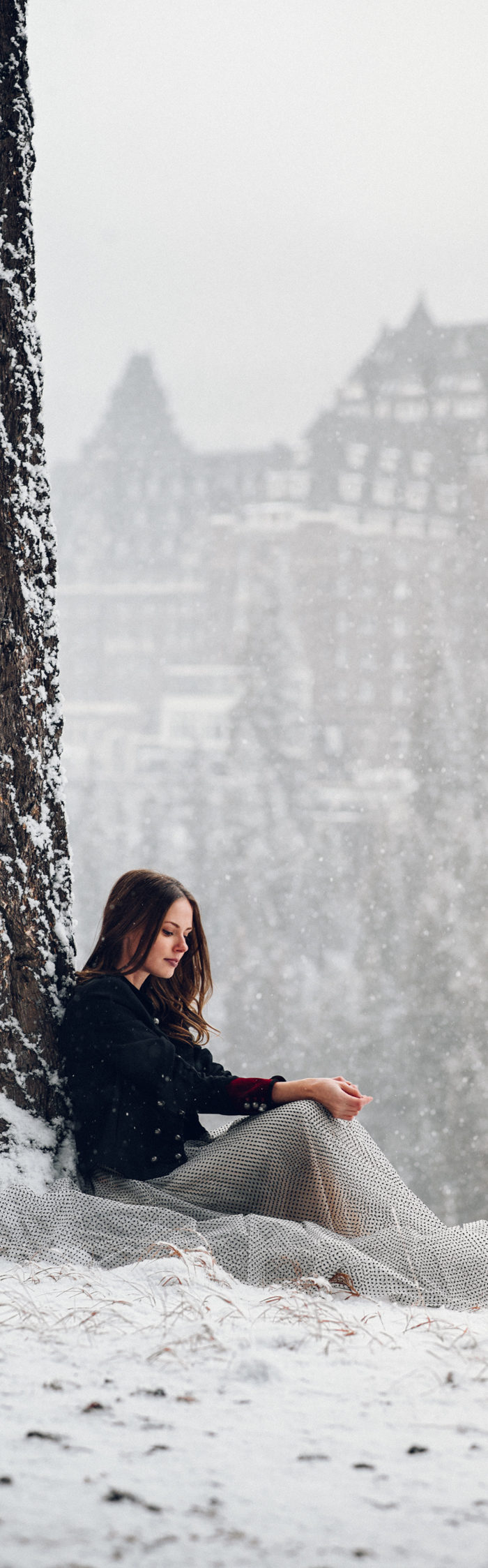 Alyssa Campanella of The A List blog experiences romance in the snow with her husband in Banff, Alberta, Canada at the Fairmont Banff Springs wearing Zimmermann Tempest ballet skirt