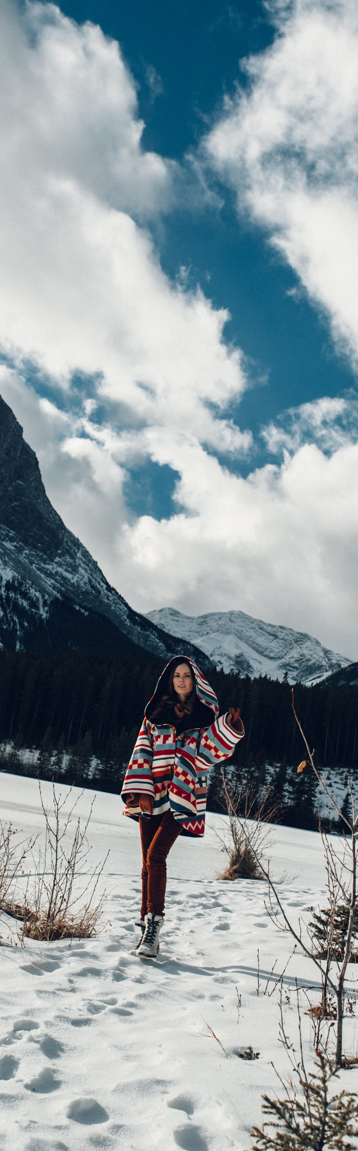 Alyssa Campanella of The A List blog sharing why I've stopped calling myself a blogger wearing Lindsey Thornburg cape in Alberta, Canada