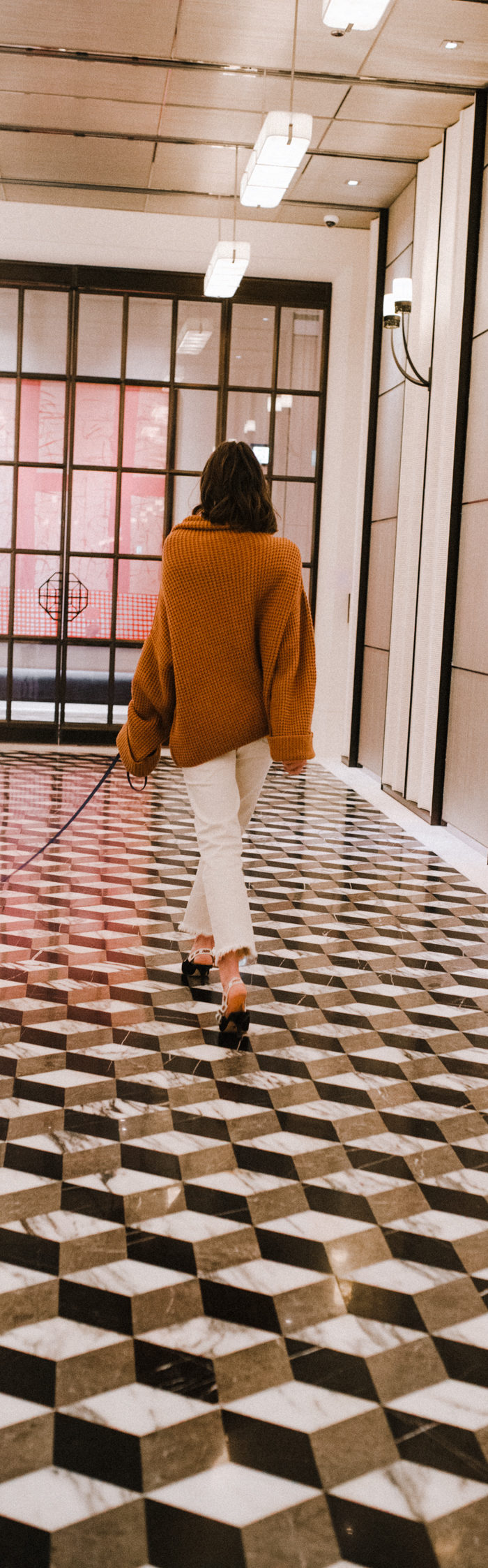 Miss USA 2011 Alyssa Campanella of The A List blog visits Rosewood Hong Kong residences in Tsim Sha Tsui wearing Free People oversized sweater, Paige Hoxton jeans, and Dior slingback heels