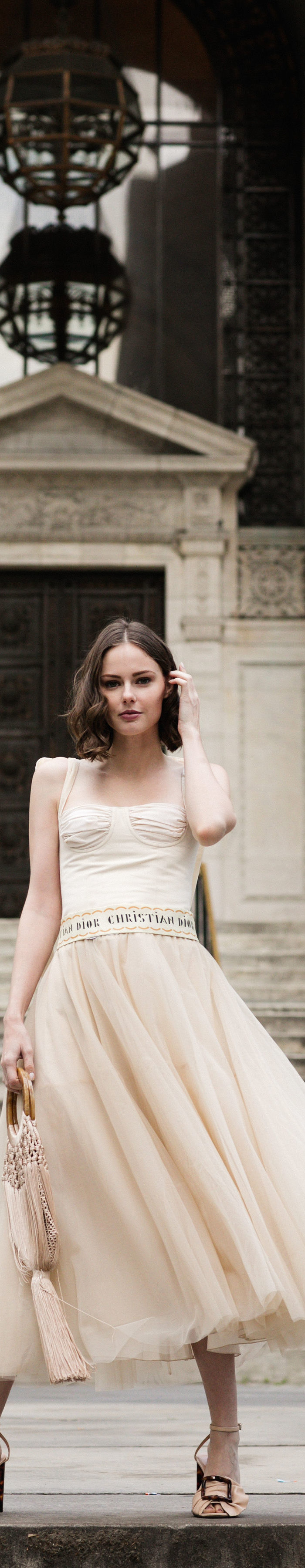 Alyssa Campanella of The A List blog shares reflections on 2019 wearing Orseund Iris top, Christian Dior belt, and Cult Gaia Angelou bag