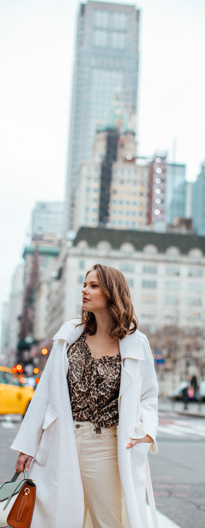 Alyssa Campanella of The A List blog shares her favorite restaurants in New York wearing Zimmermann suraya top, Strathberry midi allegro bag, and Miista yana boots.