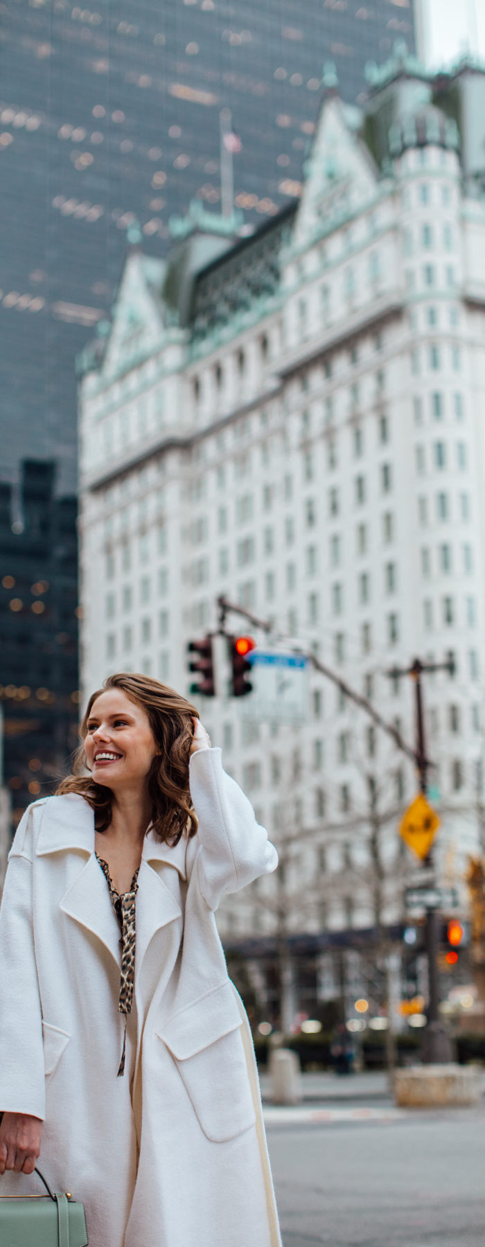 Alyssa Campanella of The A List blog shares her favorite restaurants in New York wearing Zimmermann suraya top, Strathberry midi allegro bag, and Miista yana boots.