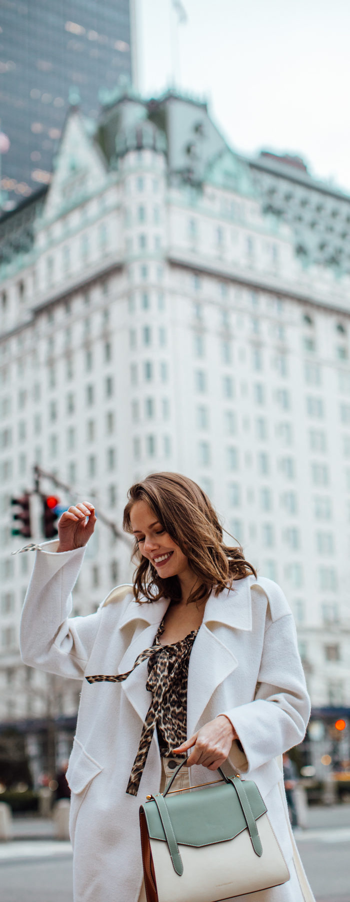 Alyssa Campanella of The A List blog shares her favorite restaurants in New York wearing Zimmermann suraya top, Strathberry midi allegro bag, and Miista yana boots.