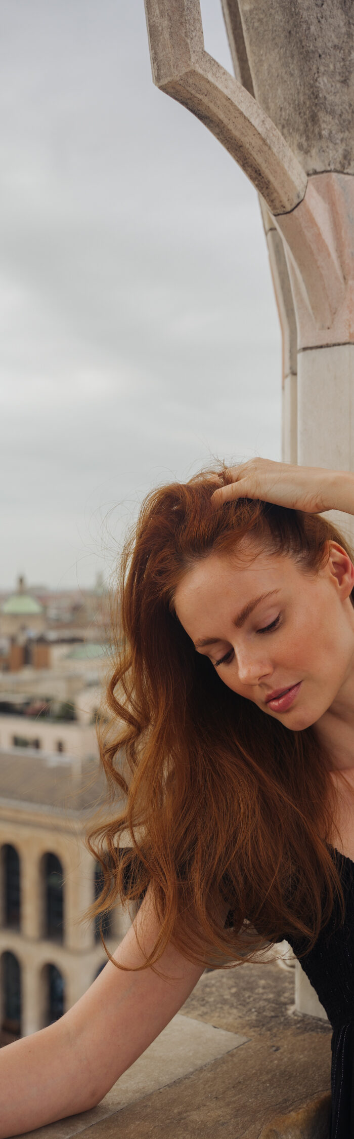 Miss USA 2011 Alyssa Campanella of The A List blog takes in the views from the top of the Duomo di Milano in Milan wearing La Ligne dress