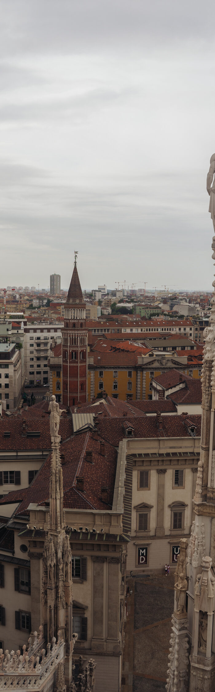 Miss USA 2011 Alyssa Campanella of The A List blog takes in the views from the top of the Duomo di Milano in Milan wearing La Ligne dress